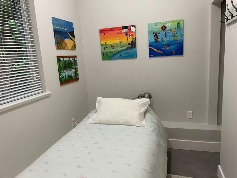 single room bed and art and layout
